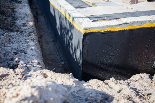 Professional Waterproofing technician working in Arcadia, SC